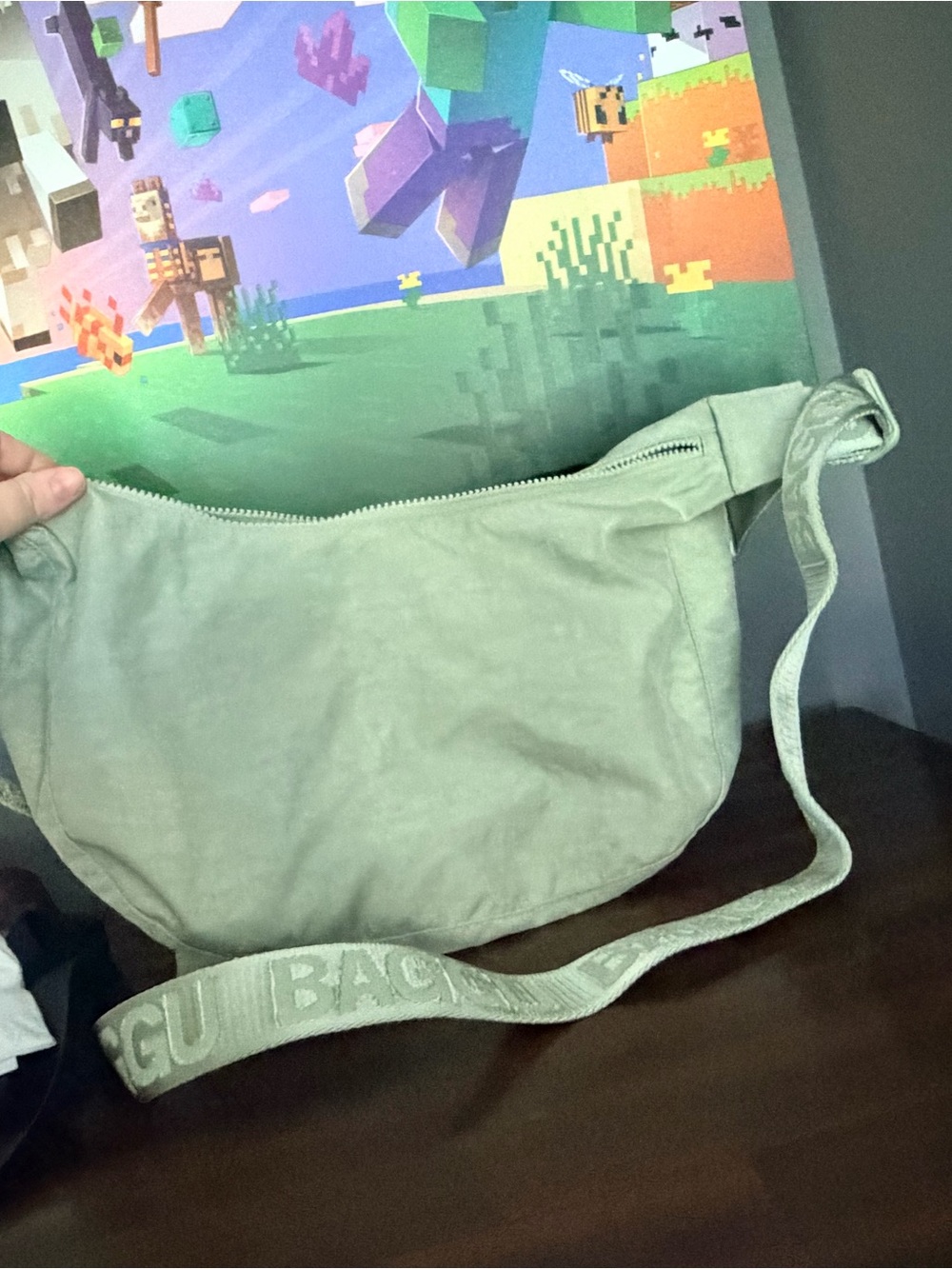 Celadon green Baggu medium crescent Crossbody Bag with Branded Strap